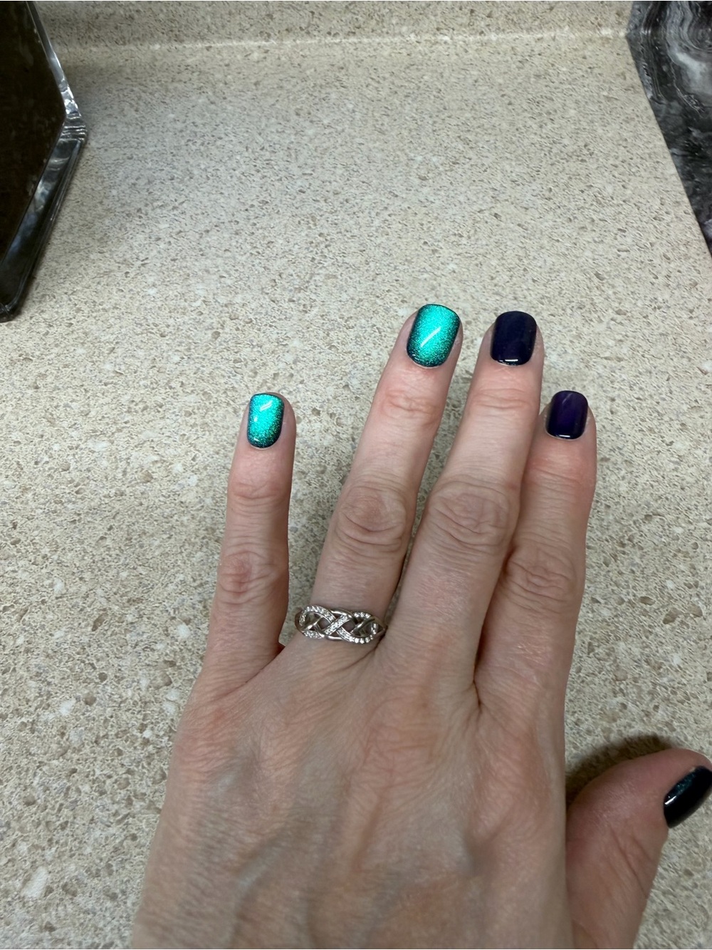 Elegant Twisted Infinity Band Ring in Silver 925 inside